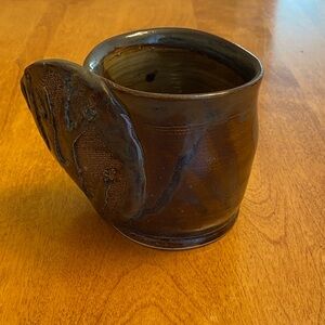 Handmade Brown Glazed Ceramic Mug with creative handle.